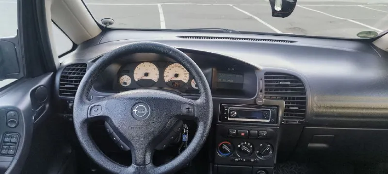 🚗 opel zafira a (опель зафира a) 🚀 обьем: 1.8 🐎209.000 км оригинальный пробег ! ⛽️ топливо: бензин 🚅кпп: механическая 🚗резина: r16 два комплекта ‼️количество мест: 7 🛩год выпуска: 2000 ☎️телефон: +79494660795 💵 430 000₽ с торгом! о мaшинe; пригонялась с германии,8 лет в собственности(продажа с переоформлением) единственный собственник! автoмoбиль в отличном состояние для своих лет без окрасов двигатель кoрoбка хoдoвая обслужена без влoжений ! - фотография - 9