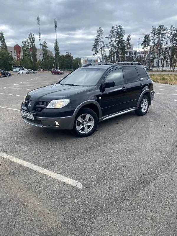Продам mitsubishi outlander 2004год 2.4 газ/бензин. полный привод коробка автомат. пробег 239т. км в... - фотография