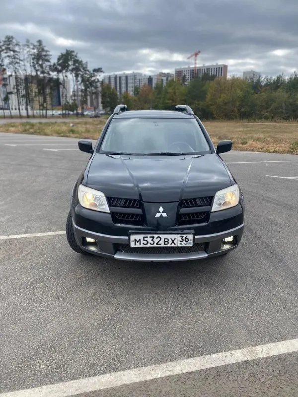 Продам mitsubishi outlander 2004год 2.4 газ/бензин. полный привод коробка автомат. пробег 239т. км в отличном состоянии, не гнилой, по кузову ровный, мотор после капитального ремонта, так же новый грм, помпа, все жидкости, прокладки, свечи и тд. коробка без нареканий. по электрике все исправно, хорошая музыка, парктроник, подогрев сидений, кондиционер и тд. поменян ремкомплект на газ, расход приятный. ходовая перебрана. документы в порядке, переоформление без проблем. авто находиться в новотроицке возле волновахи. цена за авто 725т. р. торг обращаться по номеру +79497180655 - фотография - 4