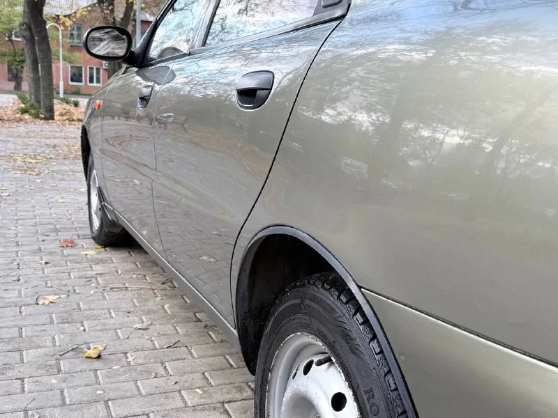 Daewoo lanos поляк 1.6 106лс 2005г евро 4 пропан ( узаконен ) гидроусилитель руля монитор с блютус автомобиль в идеальном состоянии без намека на ржавчину один собственник пробег 191т км в родном окрасе родное остекление любое оформление цена из-за срочности 255.000р +79495097888 донецк 📲 tg: дешевые колеса 📞 звоните: +7(949)5097888 - фотография - 5