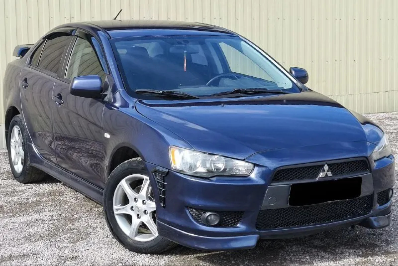 Mitsubishi lancer x (мицубиси лансер 10) год 2008 мотор 1.8 коробка автомат пробег 214.000 продажа от собственника комплектация с лепестками датчиками света и дождя и так далее. .. по тех части без вложений по кузову без рыжиков и ржавчины цена 750.000 торг реальным покупателям и у капота +79490454766 +79498069344 - фотография - 2