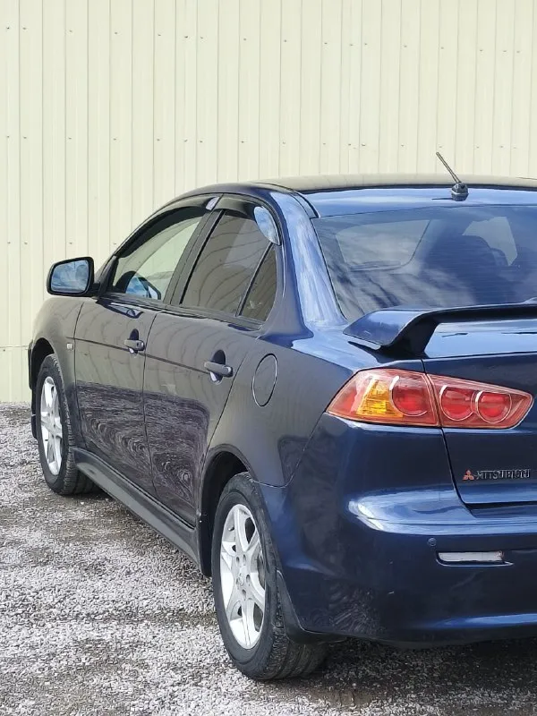 Mitsubishi lancer x (мицубиси лансер 10) год 2008 мотор 1.8 коробка автомат пробег 214.000 продажа от собственника комплектация с лепестками датчиками света и дождя и так далее. .. по тех части без вложений по кузову без рыжиков и ржавчины цена 750.000 торг реальным покупателям и у капота +79490454766 +79498069344 - фотография - 3