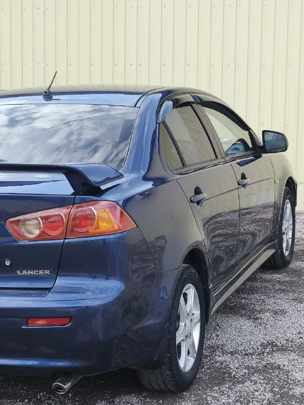 Mitsubishi lancer x (мицубиси лансер 10) год 2008 мотор 1.8 коробка автомат пробег 214.000 продажа от собственника комплектация с лепестками датчиками света и дождя и так далее. .. по тех части без вложений по кузову без рыжиков и ржавчины цена 750.000 торг реальным покупателям и у капота +79490454766 +79498069344 - фотография - 4