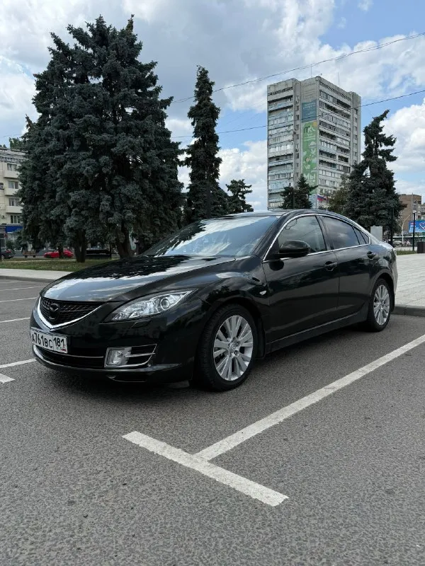 Продается mazda 6 ii (gh), 2008 год марка и модель: mazda 6 ii (gh) год выпуска: 2008 тип кузова: седан цвет: черный пробег: 253,000 км двигатель: 2.л / 150л. с. / бензин трансмиссия: автоматическая привод: передний --- - просторный салон с кожаной отделкой руля и рычага кпп. - передние сиденья с подогревом. -бортовой планшет -мультируль -круизконтроль -датчик света -датчик дождя -двухзонный климат контроль -камера заднего вида -сигнализация starline с авто запуском цена 930.000 торг у капота контакты: +79592095342 - артём осмотр г. луганск 📞 звоните: +7(959)2095342 - фотография - 6
