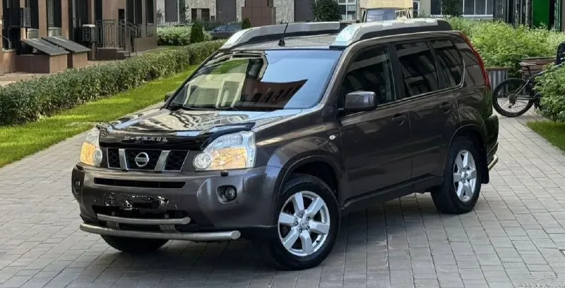 Nissan x-trail 2008 2.5 пробег- 258.000 км. кпп- автомат. полный привод птс- оригинал. 3 ключа. мотор полностью обслужен - запотевания устранены, новые катушки, свечи, масло с фильтром! кпп- также обслужена, новый радиатор охлаждения, трубки, масло с фильтром. кузов весь в родном окрасе за исключением задней левой двери и арки ( была притëртость). пороги, дно, низа дверей, арки - всё целое, заводское! в машине есть всё: мультируль, климат контроль, круиз контроль, доп. свет на крыше штатный, омыватель фар, датчик дождя, датчик света, эл. стекла и зеркала, подогрев сидений, птф, штатная магнитола и т. д. ходовая часть собранная - не гремит, не стучит ( новые шаровые, стойки стабилизатора, сайлентблоки). кардан отбалансирован, крестовины новые! салон ухоженный. юридически чистый! цена: 920.000 руб. тел: +79496462713 - фотография - 2