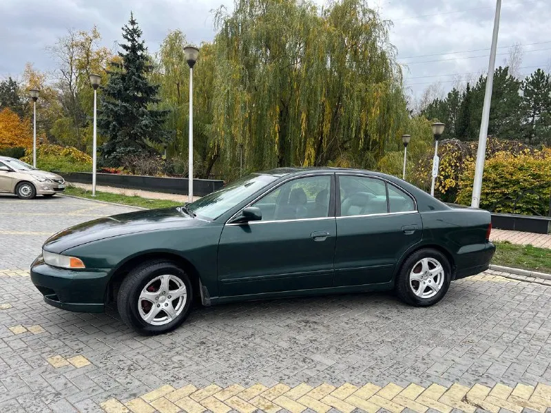 Продам mitsubishi galant 8 (рестайлинг) 2001 г. в. 2.4 ат не gdi пробег 200000 миль двигатель 2,4 литра, работает ровно, без нареканий, коробка автомат дно в норме, все стаканы целые, пороги на месте. по кузову есть возрастные недостатки, авто не новое 4 стеклоподъёмника, абс, кондиционер, кожаные сидения, хорошая музыка, установлены led линзы, люк, практически новая резина во владении 2 года, до меня была 10 лет в одних руках переоформление без проблем, штрафов и ограничений нет. на автомобиле езжу каждый день, ни разу не подводил машина находится в г. донецк контакты: +79493347150 цена: 390 000₽ + торг 📲 tg: @lilmone_0 📞 звоните: +7(949)3347150 - фотография - 2