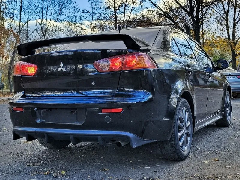 ‎mitsubishi lancer x (митсубиши лансер 10) год выпуска: 2008 двигатель: 1.8 пробег: 224 200 км коробка передач: механическая, 5-ступенчатая! ‎автомобиль в отличном состоянии, не требующий дополнительных вложений! авто юридически чист, без штрафов и запретов, готов к постановке на учёт. кузов в отличном состоянии, без следов коррозии, дно и пороги целые. комплектация: климат-контроль (заправлен и работает), круиз-контроль, датчики света и дождя, 8 подушек безопасности, мультируль, 4 стеклоподъёмника с доводчиками, электрические боковые зеркала с обогревом, камера заднего вида и функцию автопуска. автомагнитола carplay! стоимость: 730т. р.! торг возожен +79490454766 или whatsapp: +7-962-870-06-63. - фотография - 8