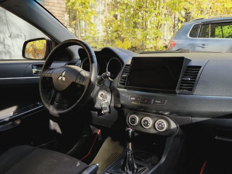 ‎mitsubishi lancer x (митсубиши лансер 10) год выпуска: 2008 двигатель: 1.8 пробег: 224 200 км коробка передач: механическая, 5-ступенчатая! ‎автомобиль в отличном состоянии, не требующий дополнительных вложений! авто юридически чист, без штрафов и запретов, готов к постановке на учёт. кузов в отличном состоянии, без следов коррозии, дно и пороги целые. комплектация: климат-контроль (заправлен и работает), круиз-контроль, датчики света и дождя, 8 подушек безопасности, мультируль, 4 стеклоподъёмника с доводчиками, электрические боковые зеркала с обогревом, камера заднего вида и функцию автопуска. автомагнитола carplay! стоимость: 730т. р.! торг возожен +79490454766 или whatsapp: +7-962-870-06-63. - фотография - 9