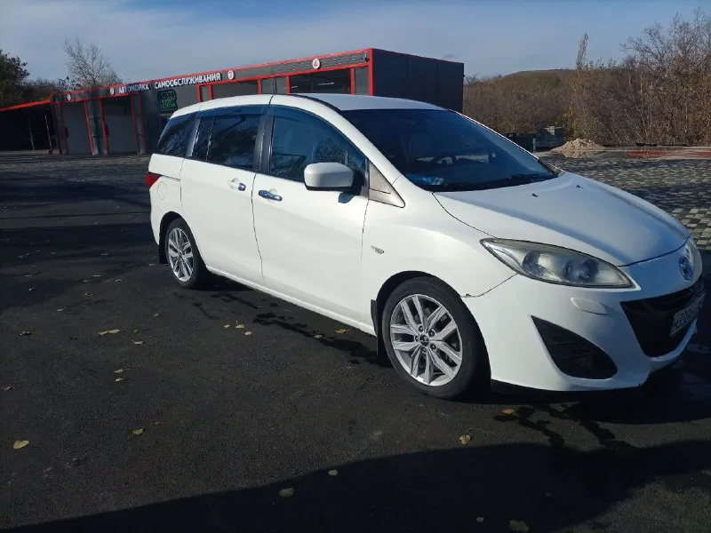 Продам 7-ми местный минивэн мазда-5, 2.0 бензин,2011г. в. пробег 236 000км. цена 1,2млн, торг около... - фотография