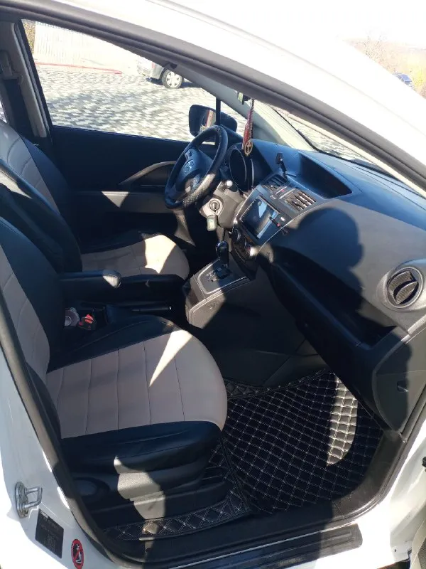 Продам 7-ми местный минивэн мазда-5, 2.0 бензин,2011г. в. пробег 236 000км. цена 1,2млн, торг около авто. машина покупалась в салоне луганска(при украине), всю жизнь была в одних руках, в птс один собственник. даигатель цепной, работает отлично, масло не ест и не дымит, работает отлично без пинков, пробуксовок(фильтр и масло новое), в двигателе масло также новое. ходовая в полном порядке. комплектация:климатконтроль, abs, esp, airbag, гур, подогрев передних седений(работает), омыватель фар, датчики дпвления шин, линзованый свет(светит очень хорошо), птф, чехлы из экокожи, красивые модельные коврики+комплект летних ковриков, легкосплавные диски r17,установлена андроид магнитола+камера заднего вида+передняя камера+задний парктроник, сигнализация с обратной связью+автозапуск. отличная, комфортная машина. вопросы по телефону +79590057091 или +79591719008 смотреть в г. брянка, лнр 📞 звоните: +7(959)0057091 - фотография - 10