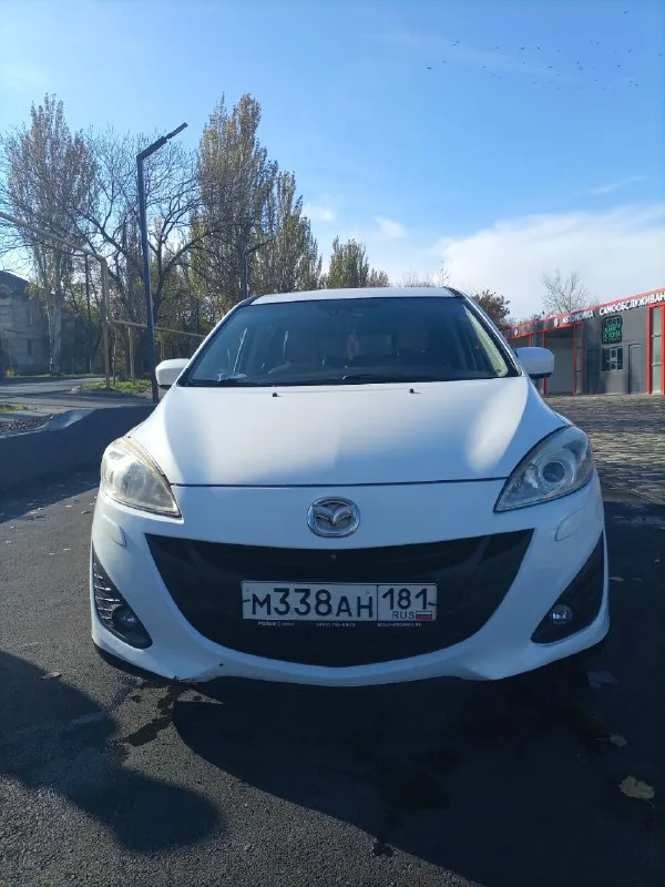 Продам 7-ми местный минивэн мазда-5, 2.0 бензин,2011г. в. пробег 236 000км. цена 1,2млн, торг около авто. машина покупалась в салоне луганска(при украине), всю жизнь была в одних руках, в птс один собственник. даигатель цепной, работает отлично, масло не ест и не дымит, работает отлично без пинков, пробуксовок(фильтр и масло новое), в двигателе масло также новое. ходовая в полном порядке. комплектация:климатконтроль, abs, esp, airbag, гур, подогрев передних седений(работает), омыватель фар, датчики дпвления шин, линзованый свет(светит очень хорошо), птф, чехлы из экокожи, красивые модельные коврики+комплект летних ковриков, легкосплавные диски r17,установлена андроид магнитола+камера заднего вида+передняя камера+задний парктроник, сигнализация с обратной связью+автозапуск. отличная, комфортная машина. вопросы по телефону +79590057091 или +79591719008 смотреть в г. брянка, лнр 📞 звоните: +7(959)0057091 - фотография - 3