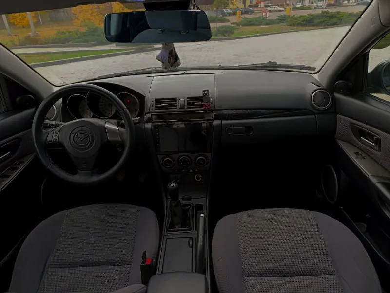 Продается mazda 3 🔥🔥🔥 рестайлинг!!! 2006 года выпуска мотор 1.6 ( атмосферный) бензин кпп: механика пробег 280 тыс. ( родной) авто в отличном состоянии✅ машина обслужена! вложений не требует. в комплектации: 🚘 климат-контроль, андроид магнитола, подогрев сидений, мультируль, 4 стеклоподъемника, линзованная оптика, автозапуск. диски r16 🛞 документы в полном порядке без арестов и штрафов, переоформление без проблем ✅ цена 675.000₽ 💵 (торг уместен) обмен не интересует! осмотр г. донецк все вопросы только по телефону📲 +79493830348 - фотография - 5