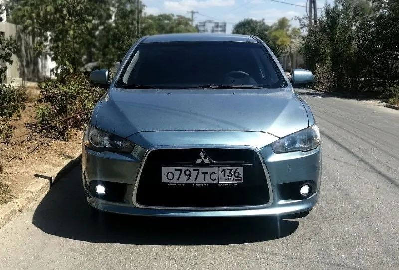 Mitsubishi lancer х 2011 год выпуска, рестайлинг !!! осмотр - донецк. тел: +7990-248-52-99 (telegram, вотсап). херсонский оператор, с феникса звонить бесплатно. цена – 685 000 ₽ не такси, не каршеринг, во владении у юрлиц никогда не была. пробег 210 тыс км 1.5 mt 109 л. с. отличная техника крепкий кузов средний рынок на рестайлинговые лансеры - 850.000 машина в хорошем рабочем состоянии. все расходники менялись вовремя по регламенту. на момент стоит новый аккумулятор, новая резина nokian, ходовая в полном порядке. есть антикоррозийная обработка, обесшумлена. двигатель заводится без каких-либо проблем, работает ровно, не троит, не дымит. мкпп работает отлично, ошибок на приборной панели нет. отличная комплектация: кондиционер, бортовой компьютер, сенсорная магнитола, abs, esp, иммобилайзер, airbag, подогревы сидений (2 режима), сигнализация starline, подогрев зеркал и заднего стекла, гур, стоит светодиодная оптика, серворуль. торг присутствует, звоните 📞 звоните: +7(990)2485299 - фотография - 3