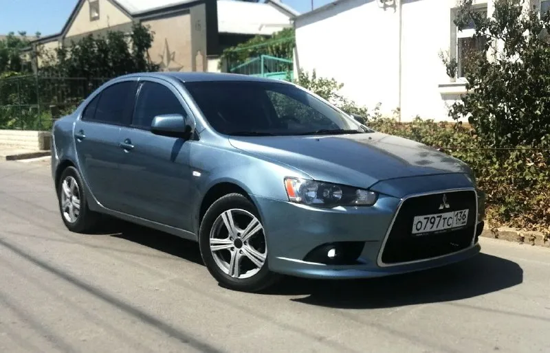 Mitsubishi lancer х 2011 год выпуска, рестайлинг !!! осмотр - донецк. тел: +7990-248-52-99 (telegram, вотсап). херсонский оператор, с феникса звонить бесплатно. цена – 685 000 ₽ не такси, не каршеринг, во владении у юрлиц никогда не была. пробег 210 тыс км 1.5 mt 109 л. с. отличная техника крепкий кузов средний рынок на рестайлинговые лансеры - 850.000 машина в хорошем рабочем состоянии. все расходники менялись вовремя по регламенту. на момент стоит новый аккумулятор, новая резина nokian, ходовая в полном порядке. есть антикоррозийная обработка, обесшумлена. двигатель заводится без каких-либо проблем, работает ровно, не троит, не дымит. мкпп работает отлично, ошибок на приборной панели нет. отличная комплектация: кондиционер, бортовой компьютер, сенсорная магнитола, abs, esp, иммобилайзер, airbag, подогревы сидений (2 режима), сигнализация starline, подогрев зеркал и заднего стекла, гур, стоит светодиодная оптика, серворуль. торг присутствует, звоните 📞 звоните: +7(990)2485299 - фотография - 6