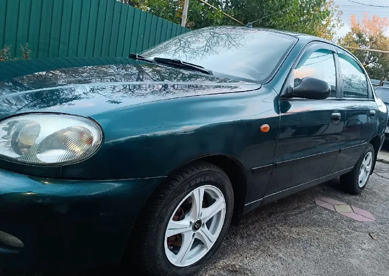 ✅ продам ланос 👮🏻‍♂️юридически чист! без штрафов залогов ограничений. 1 владелец по птс ✅ цвет темно-зеленый ✅объем двигателя (1.6) поляк ✅ пробег 197000 ✅ год изготовления 2004 г ✅ коробка механика 💵 цена 230 р (хорошим людям хороший торг) ☎️ +79494724428 просмотр автомобиля : г. донецк, ворошиловский район, золотое кольцо 🛑за машиной ухаживал. вложено в неё много усилий и души. едет хорошо, коробка в хорошем состоянии, двигатель в хорошем состоянии обслуживался вовремя. хорошая машина сел и поехал. резина огонь 🔥( комплект летней резины в отличном состоянии, переобул уже на зиму)поварена. днище обработано. гур работает отлично, новая рулевая рейка, абс проведен капитальный ремонт, кондиционер новый ремень, новый ролик, заправлен, новый стартер, шрузы, гранаты новые. по электрике недостатков нет исправно абсолютно всё. ездил к электрику всё проверили и где надо исправили, установил 2 дин магнитолу с камерой заднего вида. передние два стеклоподъёмника с доводчиками, сигн 📞 звоните: +7(949)4724428 - фотография - 4