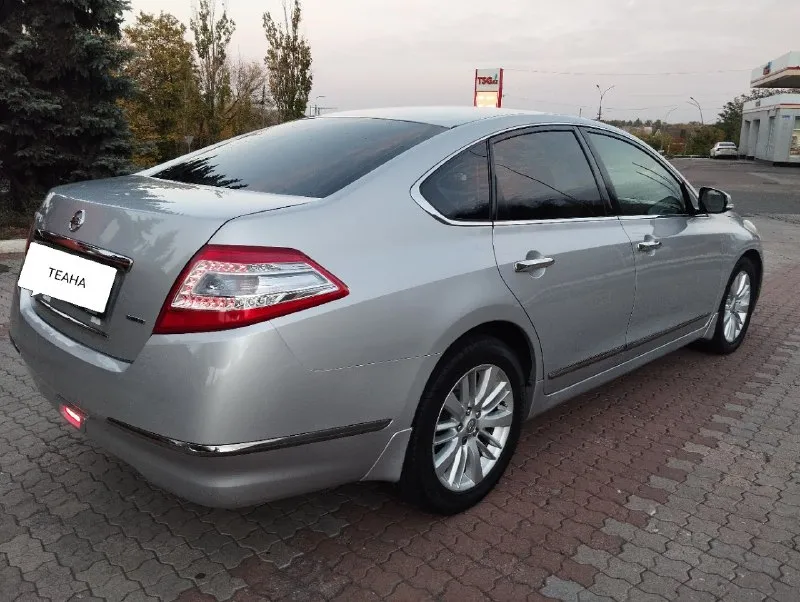 ❗ продажа от собственника❗ teana. 2011 год мотор 2.5 самый лучший в линейке - коробка- вариатор (работает идеально) пробег:242.000 -двух зонный климат контроль -кондиционер -подогрев сидений -бесключевой доступ start/stop -круиз контроль -камера заднего вида - электросиденья - омыватель фар -аудио система usb/aux -кожаный салон -мульти руль -электро зеркала -датчик света и дождя. авто в отличном состоянии без вложений, от слова совсем. любые проверки на любом сто за ваш счёт ✅ я собственник - переоформление без проблем. цена 1.🍋150 000 торг при виде денег осмотр г донецк. буденновский район. +7949-382-12-60-телеграмм-ватсапп +7949-845-25-88 📞 звоните: +7(949)3821260 - фотография - 3