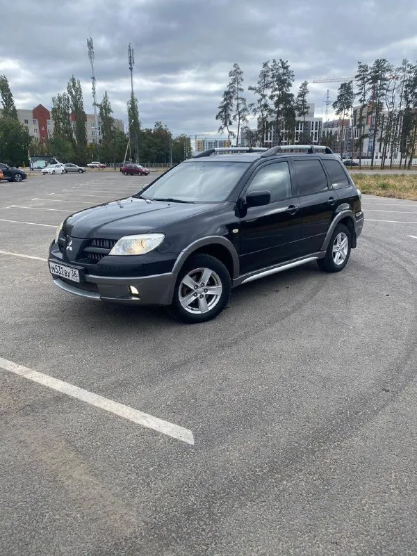 Продам mitsubishi outlander 2004год 2.4 газ/бензин. 160л. с.полный привод коробка автомат. пробег 23... - фотография