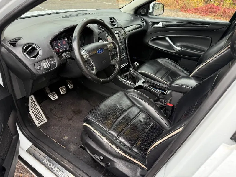 Продам ford mondeo 2012 год, объем двигателя 2,0, коробка механика комплектация люкс, кожаный салон, подогрев сидений, подогрев лобового стекла, электропакет сидений с памятью, бельгийская сборка. машина в отличном состоянии, полностью обслужена и не требует ремонта и вложений пробег 155 000 цена 1 150 000 руб. звоните телефон +79496384691 📲 tg: anna✨ 📞 звоните: +7(949)6384691 - фотография - 5