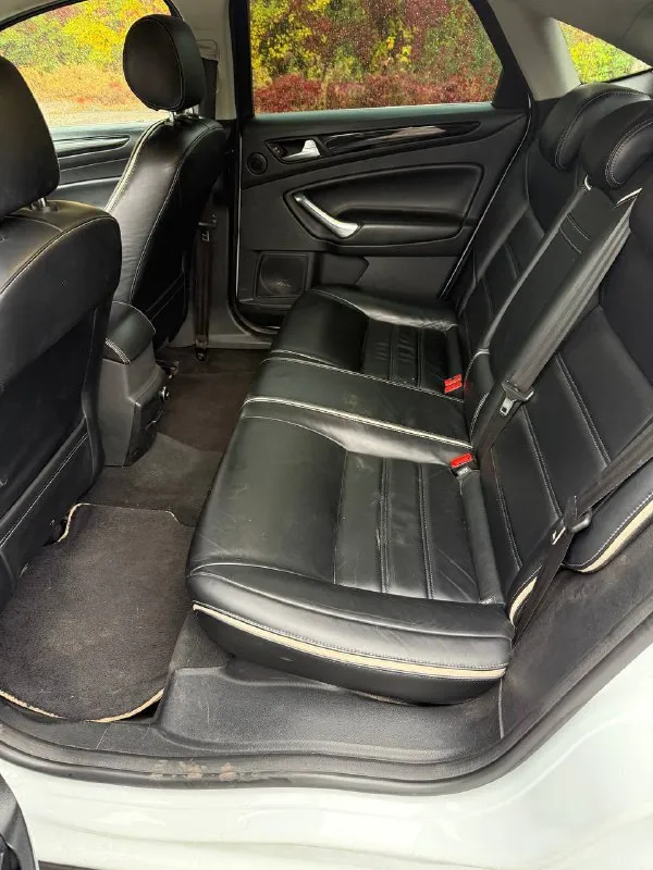 Продам ford mondeo 2012 год, объем двигателя 2,0, коробка механика комплектация люкс, кожаный салон, подогрев сидений, подогрев лобового стекла, электропакет сидений с памятью, бельгийская сборка. машина в отличном состоянии, полностью обслужена и не требует ремонта и вложений пробег 155 000 цена 1 150 000 руб. звоните телефон +79496384691 📲 tg: anna✨ 📞 звоните: +7(949)6384691 - фотография - 7