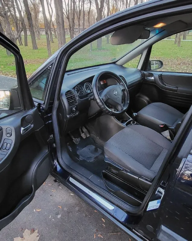 Opel зафира opel zafira 1.8 16v рестайлинг 2004 г. в. превосходное состояние авто. пригнана в 2019 году в донецк, один собственник. родной пробег, вся история обслуживания. не бит, корозии нет. стекла атермальные родные. все работает. 2 ключа. донецк. плохая связь. 590т. р. +79498049797 📞 звоните: +7(949)8049797 - фотография - 7