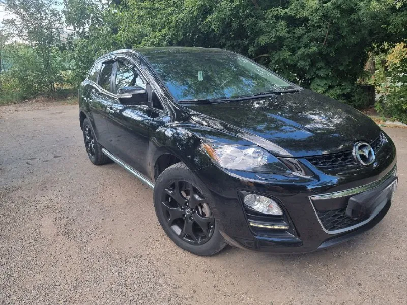 Продам: mazda сх-7, 2.2 турбодизель, 2011г. в пробег: 142000км. , ухоженное состояние, коробка механика 6 - ступ. , полный привод, безключевой досуп, климат контроль, камера, электро сидения, зеркал; омыватель фар; чёрный кож. салон, подогрев сидений, зеркал, заднего стекла; датчики света, дождя, мёртвых зон, давления шин; системы устойчивости, заноса, пробуксовки, торможения. заменены масло в коробке, редукторе, раздатке; тормозные диски с кододками. в комплекте сервисные запчасти. есть зимняя резина. мариуполь. цена: 1400000руб. тел. +79497260663 📲 tg: андрей валериевич 📞 звоните: +7(949)7260663 - фотография - 2