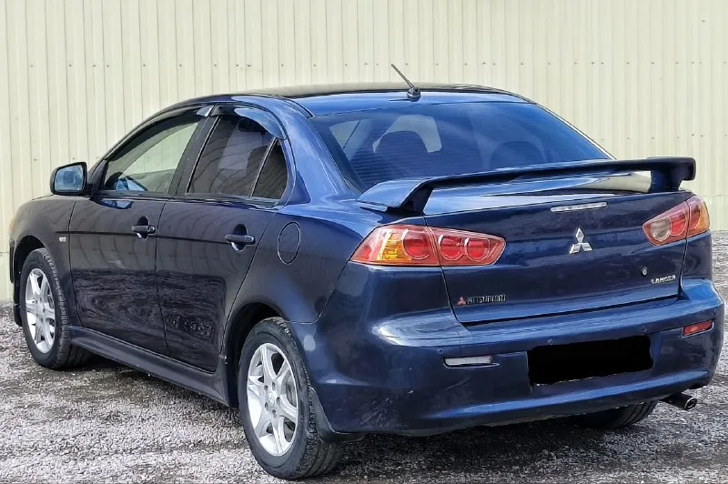 Mitsubishi lancer x (мицубиси лансер 10) год 2008 мотор 1.8 коробка автомат пробег 214.000 продажа от собственника комплектация с лепестками датчиками света и дождя и так далее. .. по тех части без вложений по кузову без рыжиков и ржавчины цена 675.000 торг более подробно по телефону +79490454766 +79498069344 осмотр - фотография - 5