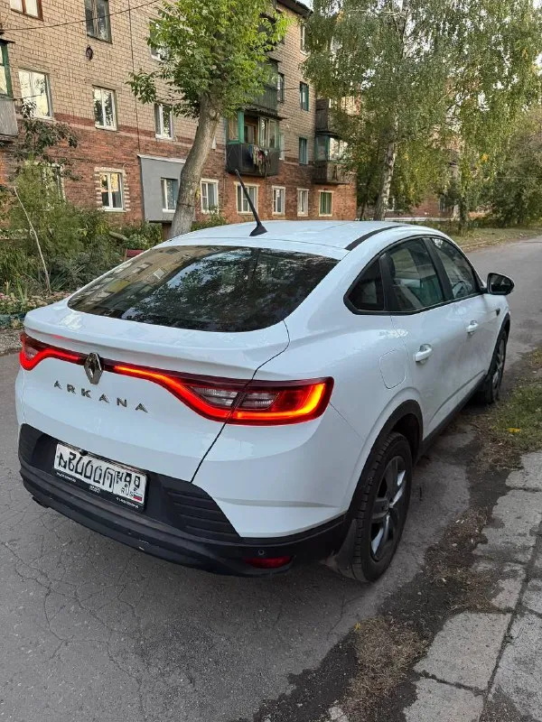 Продам кроссовер 👍 renault arkana 2021г аркана 1.6 бензин, коробка автомат пробег 123т. км. (реальный)‼ учёт рф 🇷🇺 1 хозяин ‼ авто в отличном состоянии, без вложений. заводская лэд оптика(ближний и дальний). новые зимние шины без пробега состояние нового автомобиля 👍 хорошая комплектация ✅акпп ✅бесключевой доступ ✅камера заднего вида ✅кнопка старт-стоп ✅климат-контроль ✅esp ✅asr, abs ✅система помощи при старте в гору (hsa) ✅система помощи при торможении (bas, ebd) ✅обогрев руля ✅air bag ✅led дхо ✅регулировка руля. ✅регулировка сидений по высоте ✅кожаный мультируль с подогревом ✅оригинальные диски r17 цена - 1370000 руб торг ☎+7(949)3568852 +79499717090 авто находится в макеевке - фотография - 4