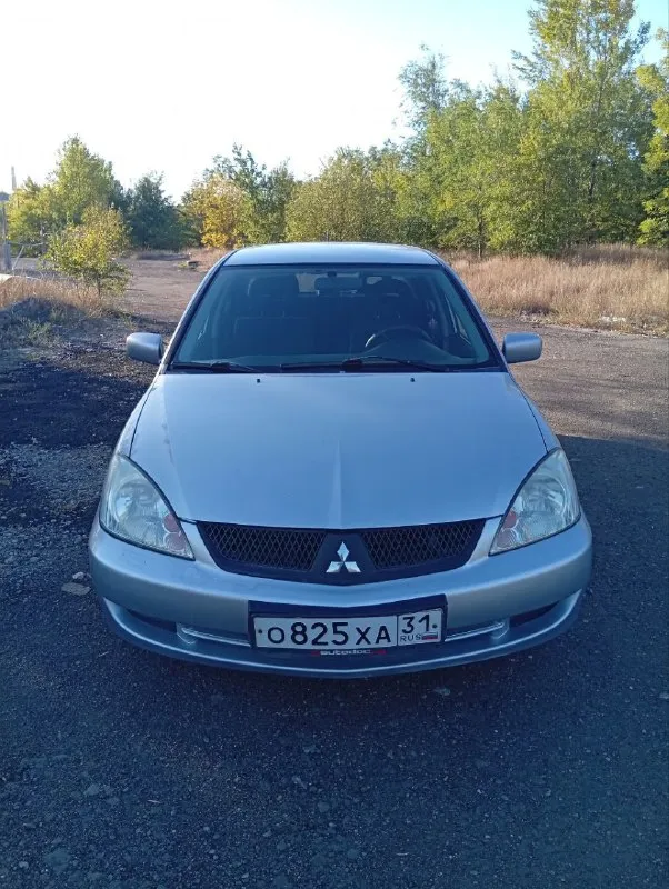 Мицубиси ланцер. 2006 год выпуска, 1.6 бензин, мех 5 ст. пробег 196.000км. автомобиль в хорошем состоянии, полностью на ходу. по кузову в хорошем состоянии (есть конечно рыжики, на переднем крыле, и на задних арках, но не критические без дыр). все стекла оригинал! (лобовое с трещиной) установленна короткоходовая кулиса кпп, распорка " стаканов"!салон в отличном состоянии, вся электрика рабочая, кондиционер рабочий. мотор после ремонта! (были заменены кольца, вкладыши, маслосьмные кольца, ,притерта гбц, +замена грм). по договоренности предоставлю авто на проверку на ваше сто. юридически оформление без проблем!автотека по запросу. могу выслать видео авто. осмотр донецк, ленинский район. прошу 350.000 рублей, торг уместен у капота. больше информации по +79493954619 - фотография - 2