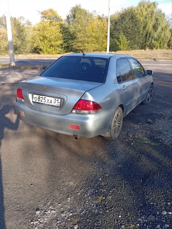 Мицубиси ланцер. 2006 год выпуска, 1.6 бензин, мех 5 ст. пробег 196.000км. автомобиль в хорошем состоянии, полностью на ходу. по кузову в хорошем состоянии (есть конечно рыжики, на переднем крыле, и на задних арках, но не критические без дыр). все стекла оригинал! (лобовое с трещиной) установленна короткоходовая кулиса кпп, распорка " стаканов"!салон в отличном состоянии, вся электрика рабочая, кондиционер рабочий. мотор после ремонта! (были заменены кольца, вкладыши, маслосьмные кольца, ,притерта гбц, +замена грм). по договоренности предоставлю авто на проверку на ваше сто. юридически оформление без проблем!автотека по запросу. могу выслать видео авто. осмотр донецк, ленинский район. прошу 350.000 рублей, торг уместен у капота. больше информации по +79493954619 - фотография - 5