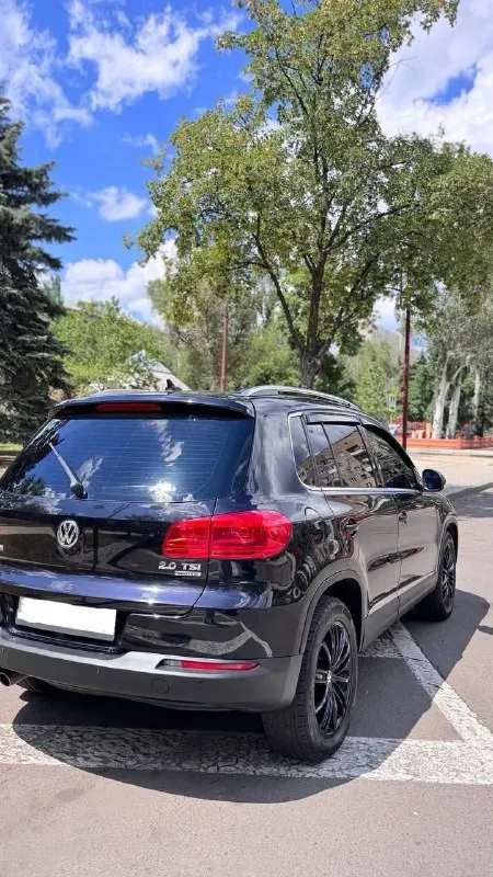 Volkswagen tiguan рестайлинг, 2013 год коробка автомат объем 2.0 л бензин максимальная комплектация автозапуск starline пробег 102 000 км цена 1 700 000 звонить : +79497030888 - фотография - 2