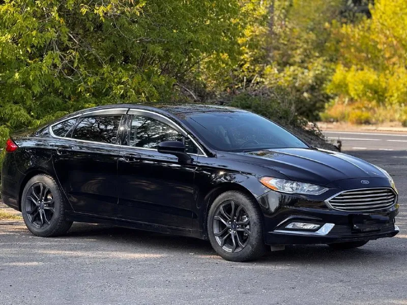 Продам ford fusion (north america) 2018 г. в., двигатель 1.5 ecoboost (181 л. с.). низкий пробег оригинальный - 31000. 6-ти ступенчатая коробка автомат (aisin). авто старт/стоп на светофорах, мультируль, кожаный салон, регулировка водительского сиденья в 10 направлениях, круиз контроль, климат контроль, качественная музыка, камера заднего вида, парктроники цена 1550000 руб. торг. возможен обмен !! все вопросы по телефону +79494126265 - фотография - 2