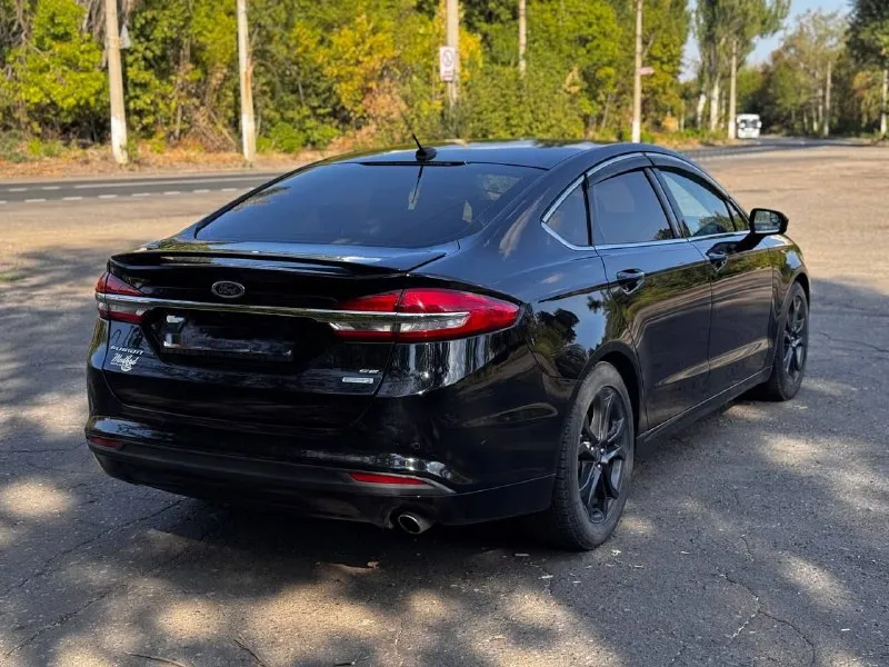 Продам ford fusion (north america) 2018 г. в., двигатель 1.5 ecoboost (181 л. с.). низкий пробег оригинальный - 31000. 6-ти ступенчатая коробка автомат (aisin). авто старт/стоп на светофорах, мультируль, кожаный салон, регулировка водительского сиденья в 10 направлениях, круиз контроль, климат контроль, качественная музыка, камера заднего вида, парктроники цена 1550000 руб. торг. возможен обмен !! все вопросы по телефону +79494126265 - фотография - 3