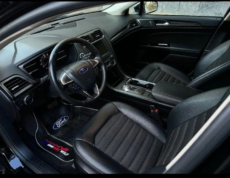 Продам ford fusion (north america) 2018 г. в., двигатель 1.5 ecoboost (181 л. с.). низкий пробег оригинальный - 31000. 6-ти ступенчатая коробка автомат (aisin). авто старт/стоп на светофорах, мультируль, кожаный салон, регулировка водительского сиденья в 10 направлениях, круиз контроль, климат контроль, качественная музыка, камера заднего вида, парктроники цена 1550000 руб. торг. возможен обмен !! все вопросы по телефону +79494126265 - фотография - 7