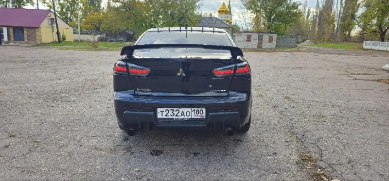 Mitsubishi lancer х 😎 пробег 159000km🛞 год выпуска 2012 объем двигателя 1,8 16 клоп 147 л. с. установлены кастомные фары зад и перед с анимацией приветствия😍(родные лежат в рабочем состоянии идут в комплекте) сигнализация старлайн с автозапуском, два ключа🔑 кондиционер заправлен работает исправно👍 2-х режимный подогрев передних седений🔥 4 электро стеклоподъемника! электро регулировка зеркал с подогревом! установлен выпускной коллектор 4,2,1 и сделан кастомный выхлоп🤤 2 комплекта резины на дисках зима лето👍 лето на r17 rays volk😍 сделан капитальный антикор днища!!! мультируль и круиз контроль! установлен автозвук без колхоза на место штатной акустики, 4 динамика dst усилок на них pride quattro xl, саб 12 machete с номинальной мощностью в 1200 моноблок machete 1500, две пищалки в штатных местах и питает все это андроид магнитола 10 дюймов 4/64gb🔊звук очень насыщенный и качественный🤤 цена 1 160 000 руб. торг по факту у капота! +79495106384 сергей(если нет связи на этот же номер в тг пишите) - фотография - 3