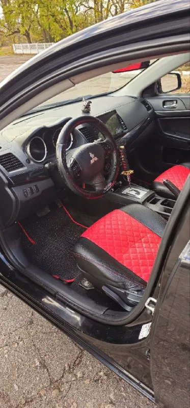 Mitsubishi lancer х 😎 пробег 159000km🛞 год выпуска 2012 объем двигателя 1,8 16 клоп 147 л. с. установлены кастомные фары зад и перед с анимацией приветствия😍(родные лежат в рабочем состоянии идут в комплекте) сигнализация старлайн с автозапуском, два ключа🔑 кондиционер заправлен работает исправно👍 2-х режимный подогрев передних седений🔥 4 электро стеклоподъемника! электро регулировка зеркал с подогревом! установлен выпускной коллектор 4,2,1 и сделан кастомный выхлоп🤤 2 комплекта резины на дисках зима лето👍 лето на r17 rays volk😍 сделан капитальный антикор днища!!! мультируль и круиз контроль! установлен автозвук без колхоза на место штатной акустики, 4 динамика dst усилок на них pride quattro xl, саб 12 machete с номинальной мощностью в 1200 моноблок machete 1500, две пищалки в штатных местах и питает все это андроид магнитола 10 дюймов 4/64gb🔊звук очень насыщенный и качественный🤤 цена 1 160 000 руб. торг по факту у капота! +79495106384 сергей(если нет связи на этот же номер в тг пишите) - фотография - 6