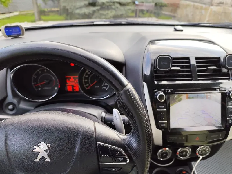 Продам peugeot peugeot 4008. 2012 год. цена снижена в связи с покупкой недвижимости. автомат, с возможностью переключения передач в ручном режиме, лепестками на руле. полный привод с регулировкой привода, передний, auto,4 wd постоянный. передние и задние парктроники. камера заднего вида. датчики света и дождя. круиз контроль. климат контроль. мульти руль. монитор с навигацией. состояние очень хорошее. крашена крышка багажника и задний бампер. на 228 000 км. была замена двигателя на контрактный, с пробегом 70 000 км. зарегистрирован в мрэо. цена 900 000 рублей. находится в мариуполе. +79495018883 📲 tg: @miha8864 📞 звоните: +7(949)5018883 - фотография - 8