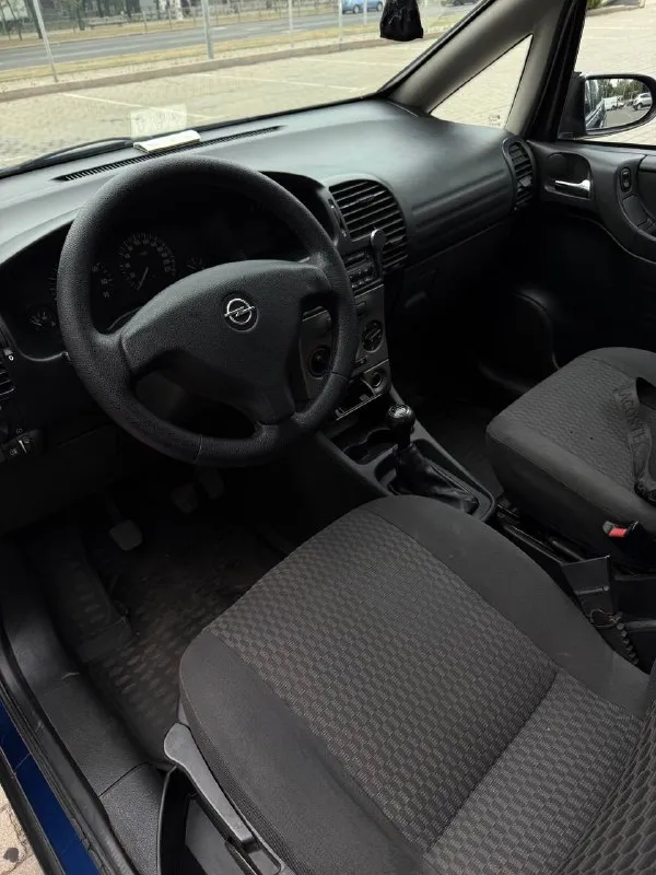Opel зафира а 2004г автомобиль в отличном состоянии двс 1.8 в отличном состоянии. установлено итальянское евро 4 автомобиль пригнан из германии в 2020г заводской окрас гнили нет. все стекла, включая лобовое заводские. пробег 205 тыс км кондиционер работает. новая резина документы чистые, любое переоформление. цена 595 тыс. руб. торг остальные вопросы по +79496167066 📲 tg: @djdjv12 📞 звоните: +7(949)6167066 - фотография - 9