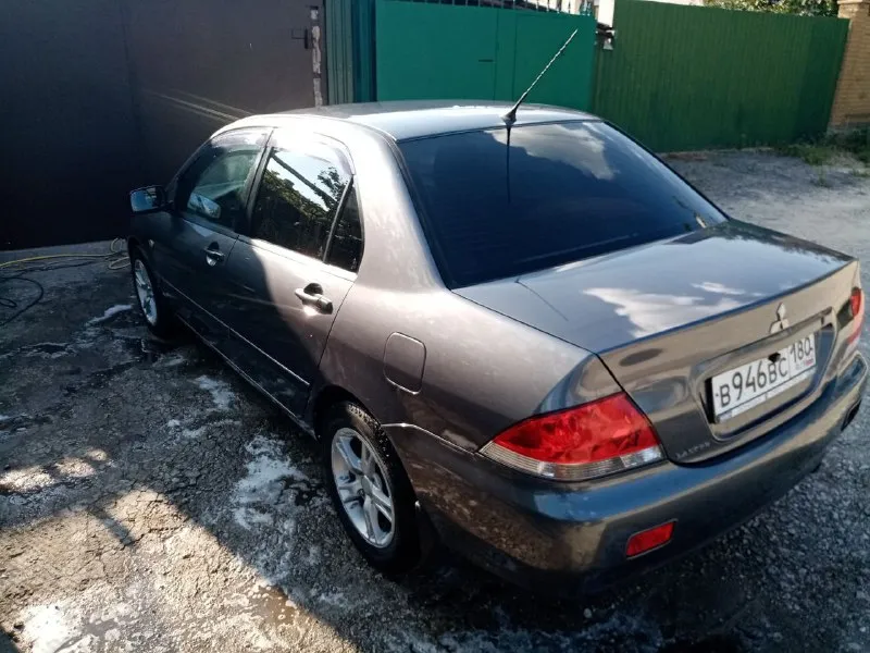 Донецк. mitsubishi 9, на газу 550 000 руб. модель:lancer тип кузова:седан год выпуска:2005 пробег:200000 км коробка передач:механическая объём двигателя:1.6 см3 вид топлива:бензин/газ мощность:98 л. с. машина в отличном состоянии. капитальный ремонт двигателя сделан год назад. ходовка новая. газовое оборудование зарегистрировано. гаражное хранение. технически не требует вложений. привод передний. электростеклоподъемники, кондиционер. я владелец 6 лет. +79493677424 артур. - фотография - 3