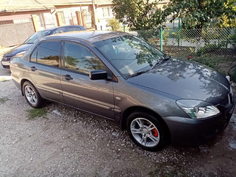 Донецк. mitsubishi 9, на газу 550 000 руб. модель:lancer тип кузова:седан год выпуска:2005 пробег:200000 км коробка передач:механическая объём двигателя:1.6 см3 вид топлива:бензин/газ мощность:98 л. с. машина в отличном состоянии. капитальный ремонт двигателя сделан год назад. ходовка новая. газовое оборудование зарегистрировано. гаражное хранение. технически не требует вложений. привод передний. электростеклоподъемники, кондиционер. я владелец 6 лет. +79493677424 артур. - фотография - 5