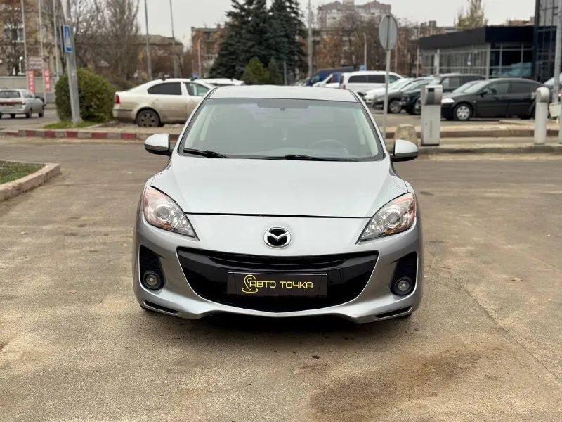 Mazda 3 рестайлинг год выпуска: 2012 двс: 1.6 кпп: автомат пробег: 177 000 км ✅оригинальный пробег ✅2 владельца по птс ✅технически исправна и обслужена стоимость: 880 000₽ возможна продажа в кредит осмотр в донецке, калининский район автосалон «авто точка» 📞 +7(949)699-31-90 📲 tg: кирилл 📞 звоните: +7(949)6993190 - фотография - 2