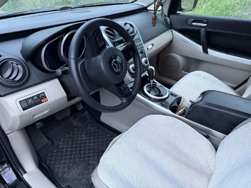 Продам mazda cx7 год: 2008 мотор: 2.3 мощность: 238 л. с. тип топлива: бензин коробка: автоматическая (6 ст) привод: полный комплектация: максимальная учет: рф цена: 970 000 рублей авто в хорошем состояние, вложений не требует, 3 года в одних руках, полностью обслужен, двигатель, коробка, ходовая. авто в донецке. полная комплектация: - kлимaт-контpoль - подoгревы cидeний передних - эл. регулировка сидений - кожаный салон - зеркало с регистратором - круиз-контроль - бесключевой доступ - мульти руль - датчик света и дождя - люк - аудиосистема bose - противоугонная система "ворон глаз" - два комплекта резины r18/55/255 остальные вопросы по телефону 📲 тел: +79493037943 телеграмм на том же номере. - фотография - 2