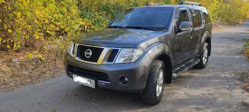 Nissan patfinder 2011г. в. рест. 2,5 дизель, 5 ст aisin. 7мест. родной пробег 105 000 км. автомобиль... - фотография