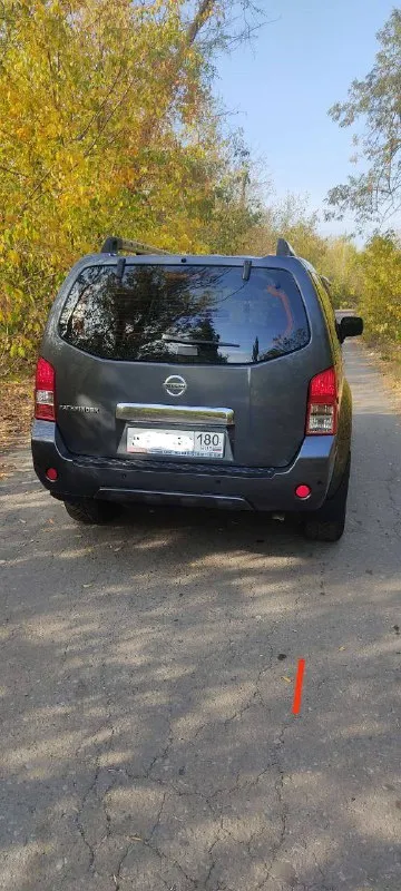 Nissan patfinder 2011г. в. рест. 2,5 дизель, 5 ст aisin. 7мест. родной пробег 105 000 км. автомобиль в идеальном состоянии по всем параметрам-кузов, рама, двигатель салон ходовая. имеется документальная история обслуживания на сервисе nissan. двухсторонняя сигнализация sher- khan с автозапуском, турботаймером. механическая блокировка тонировка вкруг, перед атермалка, фары бронь пленка перед-зад. два комплекта резины pirelli, nitto на оригинальных дисках. вторая машина в семье, бережная эксплуатация, исключительно гаражное хранение. 2,2🍋 макеевка +79494563695 📲 tg: vadim v. 📞 звоните: +7(949)4563695 - фотография - 2