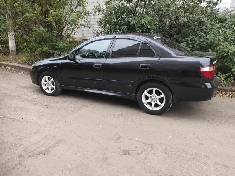 Nissan almera n16 2005 г. в, двигатель 1.5 л (98 л. с), бензин, механика, цвет черный, , привод передний, седан. комплектация comfort. гур, кондиционер, эл. привод зеркал, обогрев заднего стекла. хорошее состояние. документы все в порядке. цена: 500 000 руб. донецк. телефон: +79493394470 📲 tg: александр 📞 звоните: +7(949)3394470 - фотография - 5