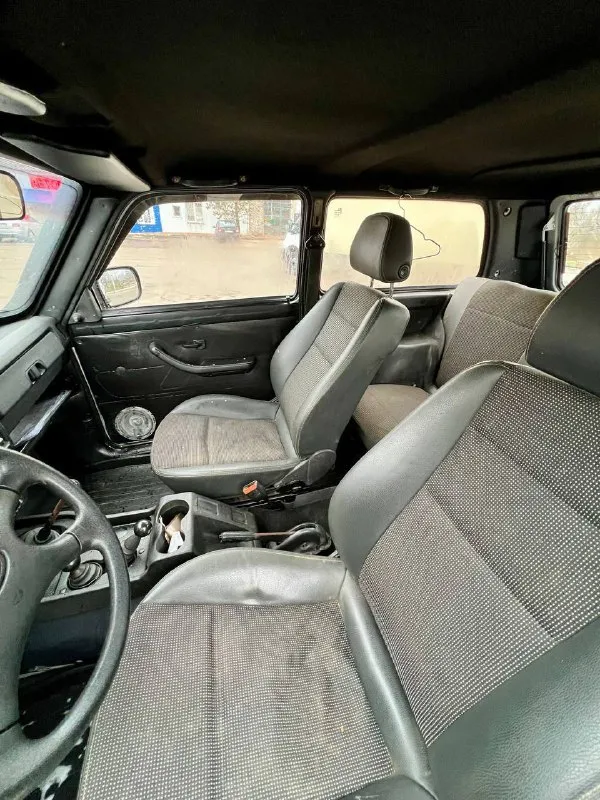 Продам ваз 2121 нива инжектор год выпуска 2003 цена 285 000 р торг в отличном состоянии коробка 5 ступка машина без вложений сел поехал мосты раздатка все работает 2 комплекта ключа с сигнализации стеклоподъемники передние подогрев стекла омыватель все по электрике работает салон на твердую пятерку сидение инамарачные осмотр город макеевка возможен пригон в другой город +7 (949) 638-01-13 - фотография - 6