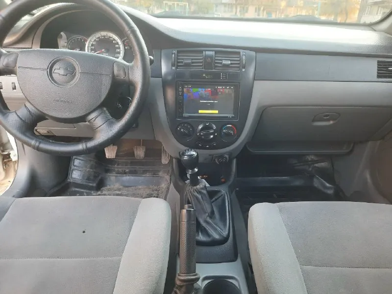 Продам chevrolet лачети в отличном состоянии не гнилой не ржавый вприкрасно белом цвете 2 хозяина за время экспулутацмм абс гур електро стеклоподьемники по двс отлично работает тихо без посторонних шумов и стуков ходовая кпп без проблем доп сигнализация музыку хорошая камера заднего вида диска р 15 смотряца очень красиво по докам без штрафов аграничение ц 535 т р торг абмен возможен на ваш авто тел +79494792653 📞 звоните: +7(949)4792653 - фотография - 6