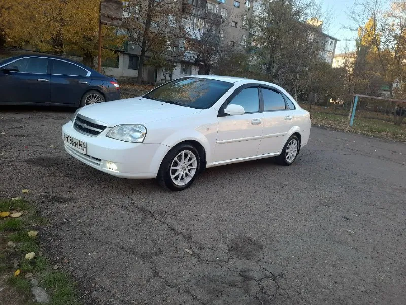Продам chevrolet лачети в отличном состоянии не гнилой не ржавый вприкрасно белом цвете 2 хозяина за время экспулутацмм абс гур електро стеклоподьемники по двс отлично работает тихо без посторонних шумов и стуков ходовая кпп без проблем доп сигнализация музыку хорошая камера заднего вида диска р 15 смотряца очень красиво по докам без штрафов аграничение ц 535 т р торг абмен возможен на ваш авто тел +79494792653 📞 звоните: +7(949)4792653 - фотография - 9