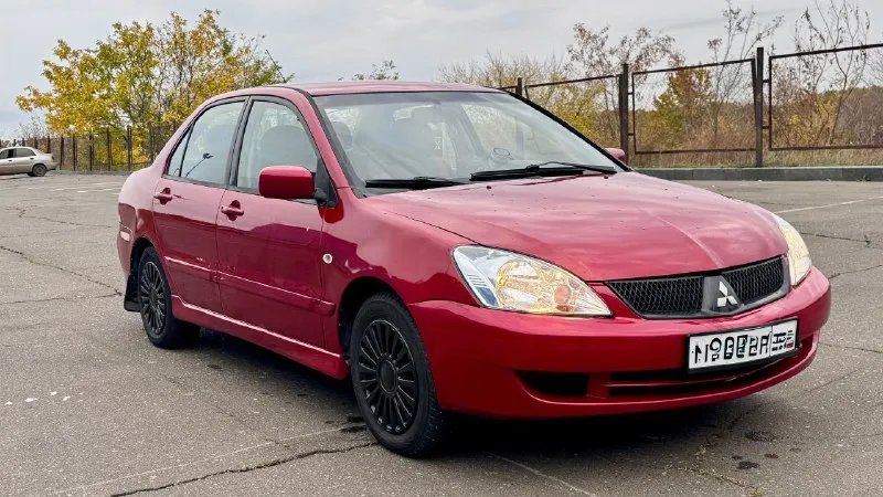 Lancer 2005 ✅цена-379000 (торг) продаётся mitsubishi lancer 2005 г. в., автомат, двигатель 1.6. хорошее состояние, кондиционер, 4 стеклоподъёмника, центральный замок. стоит зимняя шипованная резина. красивый красный цвет. по ходовой нареканий нет, двигатель работает спокойно и тихо, коробка не пинает. установлена магнитола с bluetooth, usb и aux. стоит новый аккумулятор. прошу не забывать что машине 20 лет. ✅цена-379000 (торг) +79494153100 - фотография - 3