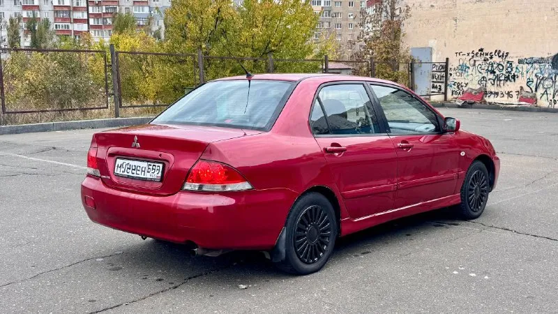 Lancer 2005 ✅цена-379000 (торг) продаётся mitsubishi lancer 2005 г. в., автомат, двигатель 1.6. хорошее состояние, кондиционер, 4 стеклоподъёмника, центральный замок. стоит зимняя шипованная резина. красивый красный цвет. по ходовой нареканий нет, двигатель работает спокойно и тихо, коробка не пинает. установлена магнитола с bluetooth, usb и aux. стоит новый аккумулятор. прошу не забывать что машине 20 лет. ✅цена-379000 (торг) +79494153100 - фотография - 4