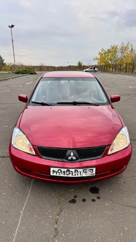 Lancer 2005 ✅цена-379000 (торг) продаётся mitsubishi lancer 2005 г. в., автомат, двигатель 1.6. хорошее состояние, кондиционер, 4 стеклоподъёмника, центральный замок. стоит зимняя шипованная резина. красивый красный цвет. по ходовой нареканий нет, двигатель работает спокойно и тихо, коробка не пинает. установлена магнитола с bluetooth, usb и aux. стоит новый аккумулятор. прошу не забывать что машине 20 лет. ✅цена-379000 (торг) +79494153100 - фотография - 7